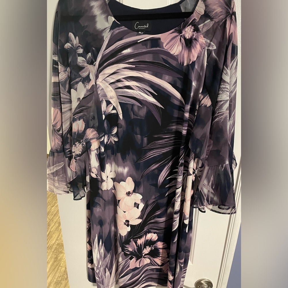 Dress is beautiful on, the sleeves sheer flowing and dress is light.